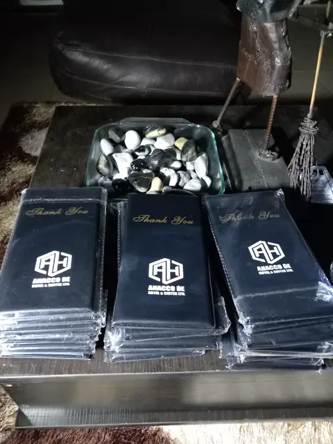 Gold-embossed thank-you bill folders printed for Anacco Hotels