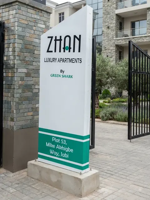 White angular totem for Zhan Luxury Apartments by Green Shark in Jabi Abuja