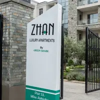White angular totem for Zhan Luxury Apartments by Green Shark in Jabi Abuja