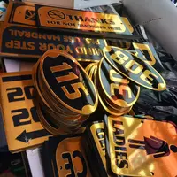 Precision-cut gold mirror plaques and room numbers for Saratoga Hotels