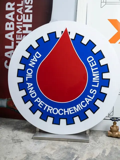 Precision-cut circular logo disc for Dan Oil and Petrochemicals Limited